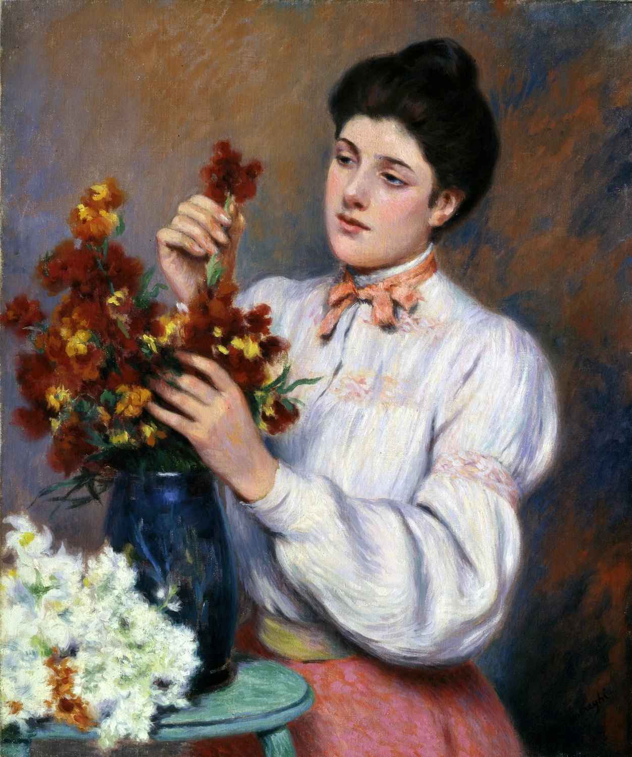 Donna che sistema i fiori - Studio d’Arte Nicoletta Colombo, Milano
